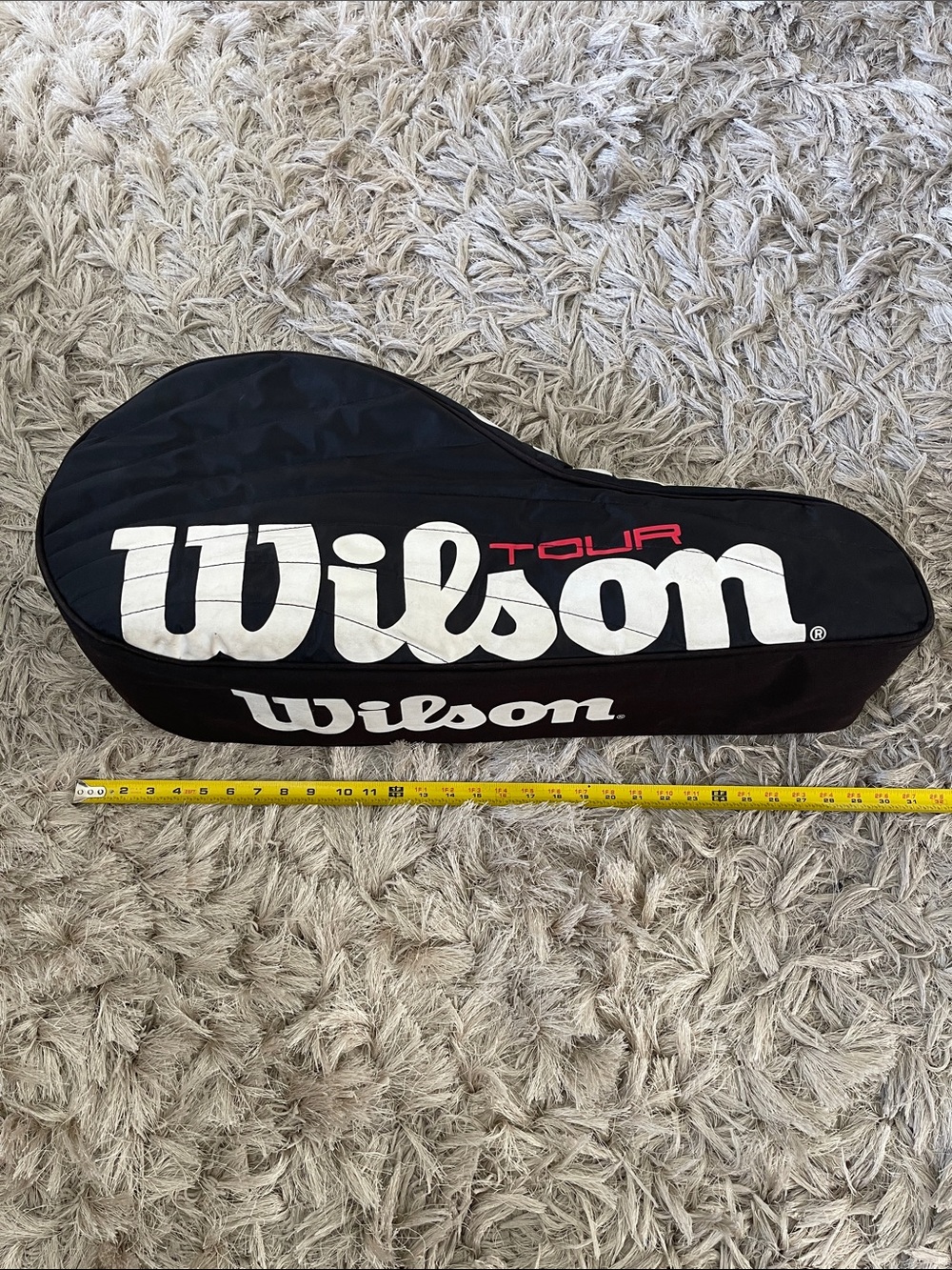 Wilson Black Tennis Racquet Cover with White Logo and Red Accent missing strap